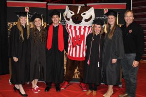 Katie Bock, Jessica Dercks, Cody Getschel, Bucky Badger, Bethany Dado, Erica Ballmer and Ted Halbach, Faculty Associate in Dairy Management